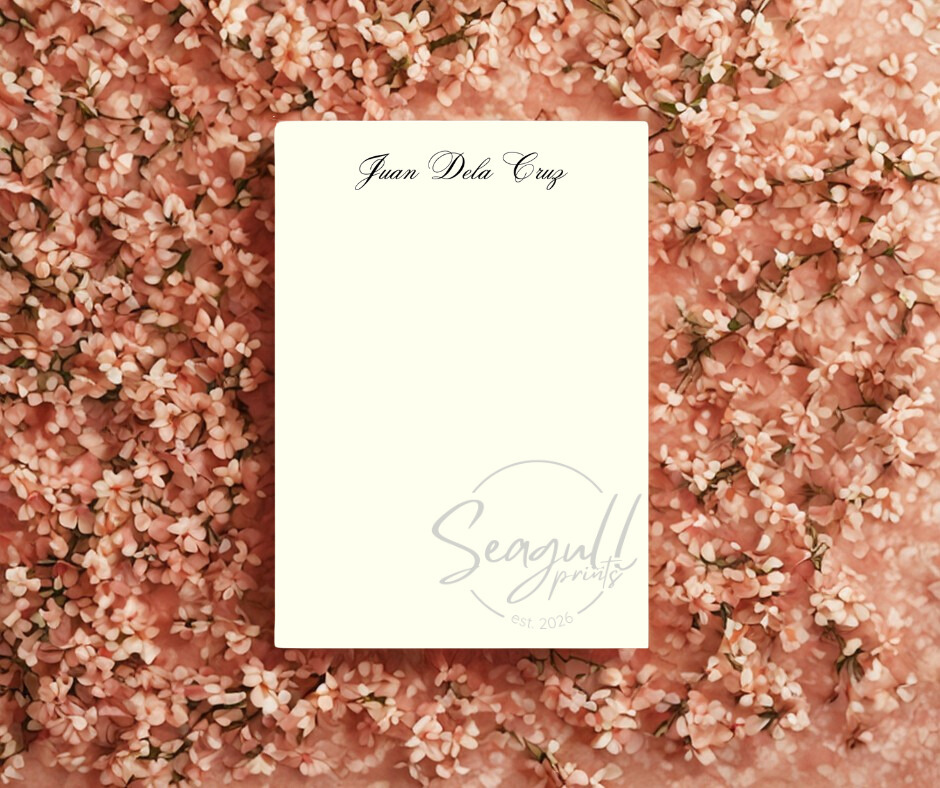A minimalist premium note pad featuring off-white A6 textured paper, styled as a professional desktop notepad.